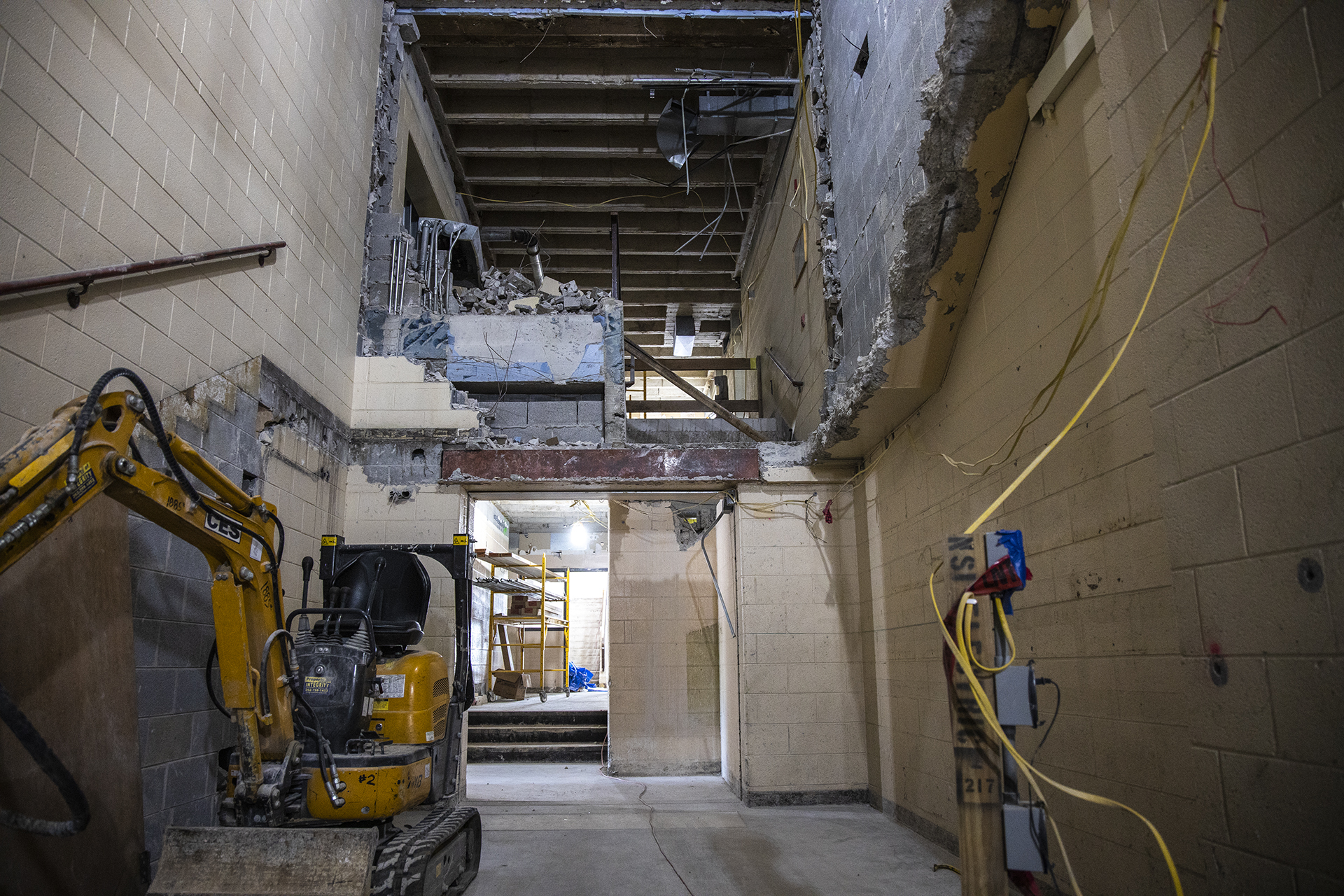 Stairwell in the 1960 building where structural beams are to be removed and floors leveled.